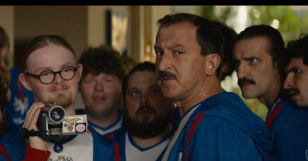 Trenér Marek a basketbalový tým Dream Team v dresech při olympiádě