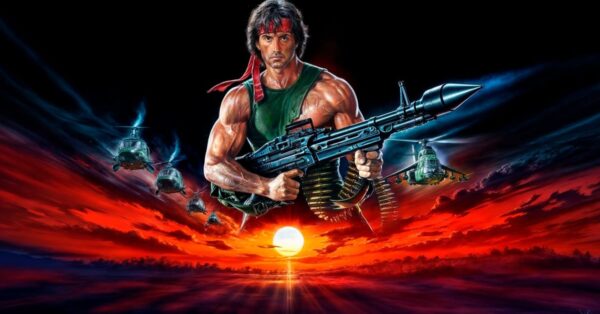 John Rambo v ikonické póze s kulometem a červenou šátkou na čele
