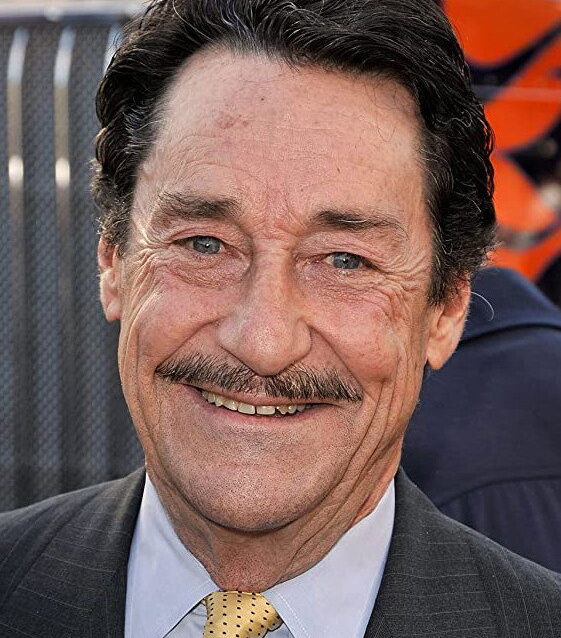 Peter Cullen, dabér Optima Prima z Transformers, se usmívá na fotografii z filmové premiéry